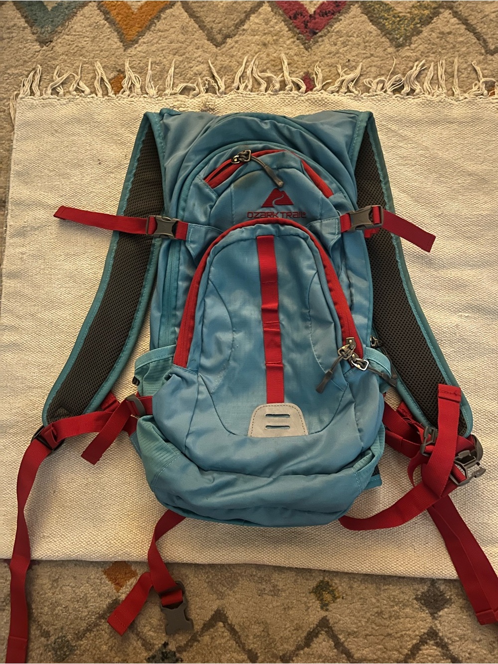 Ozark Trail 23L Riverdale Hydration Backpack Blue with Red Accents